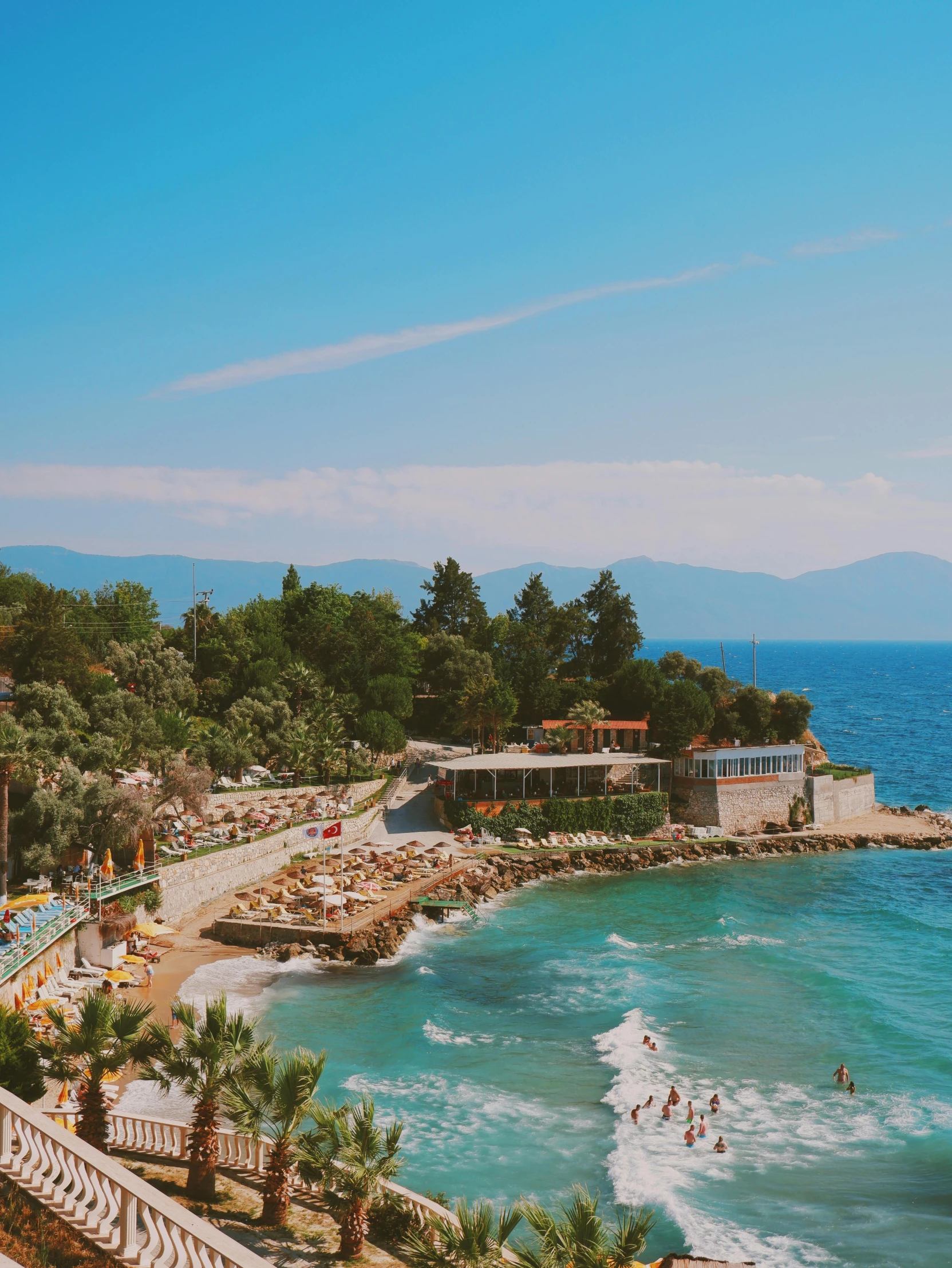 a scenic beach on a clear day with blue waters