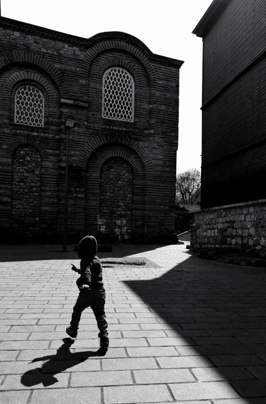 black and white po of  with umbrella and hat