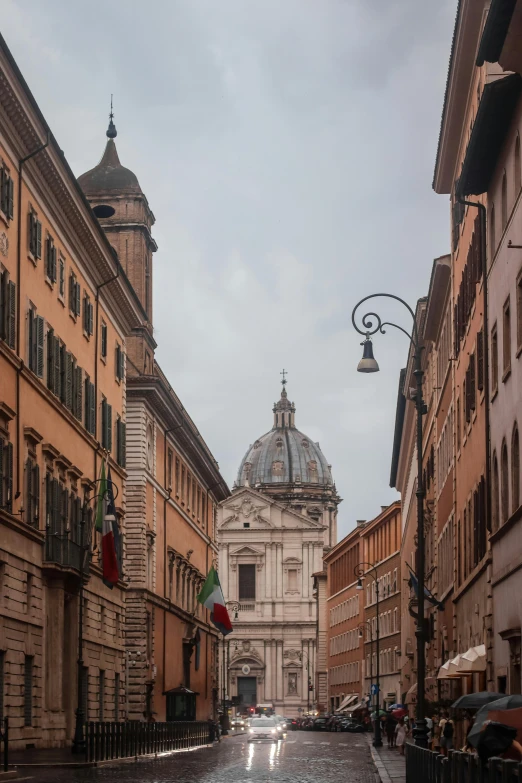 the buildings of this street have rain on them