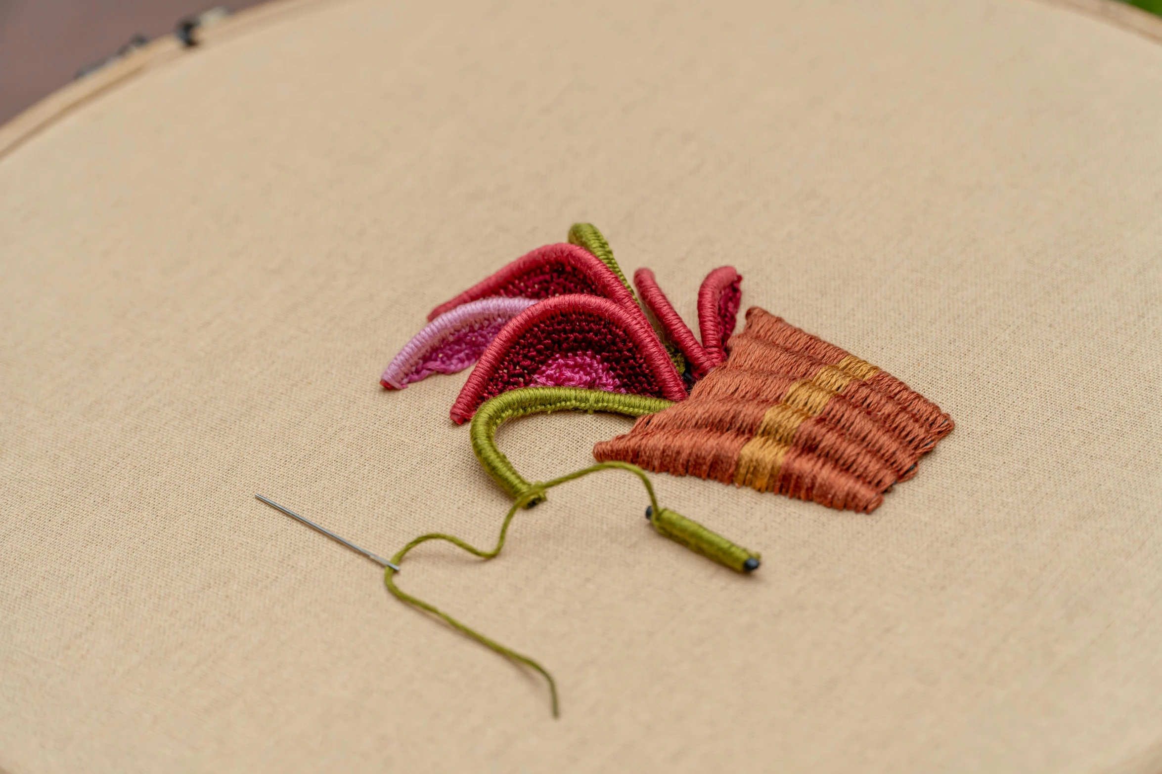 a embroidery piece with some scissors near it