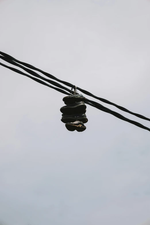 a cable with four rocks in the middle of it