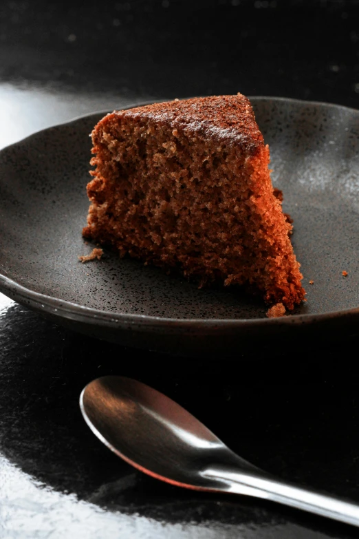 a close up of a slice of cake on a plate