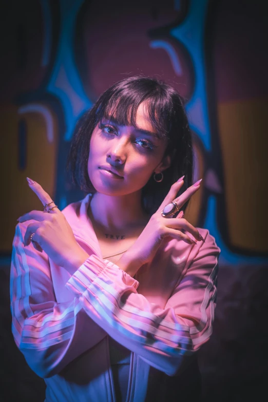 woman with finger sign showing peace, making the middle finger