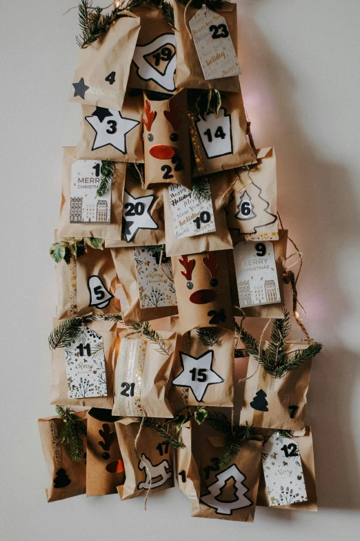 there is a christmas tree made from different bags