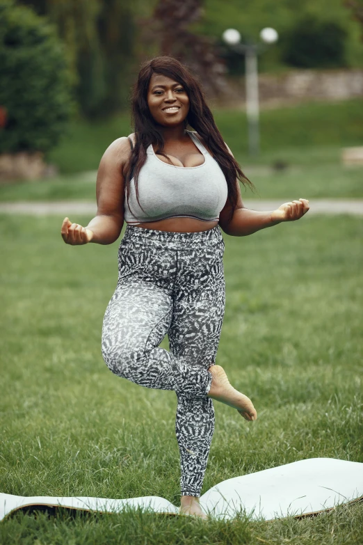 a woman stands on her hind legs in the air