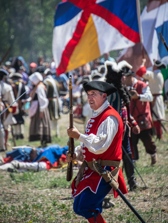 people dressed in military outfits at a historical event