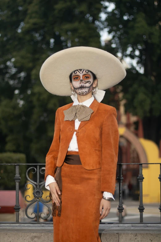 a man in a costume that appears to be wearing mexican sugar makeup