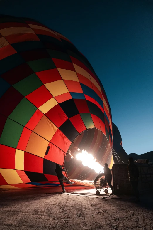 a person is lighting soing in a large balloon