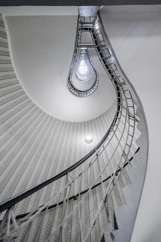 some spiral stairs going up in the sky