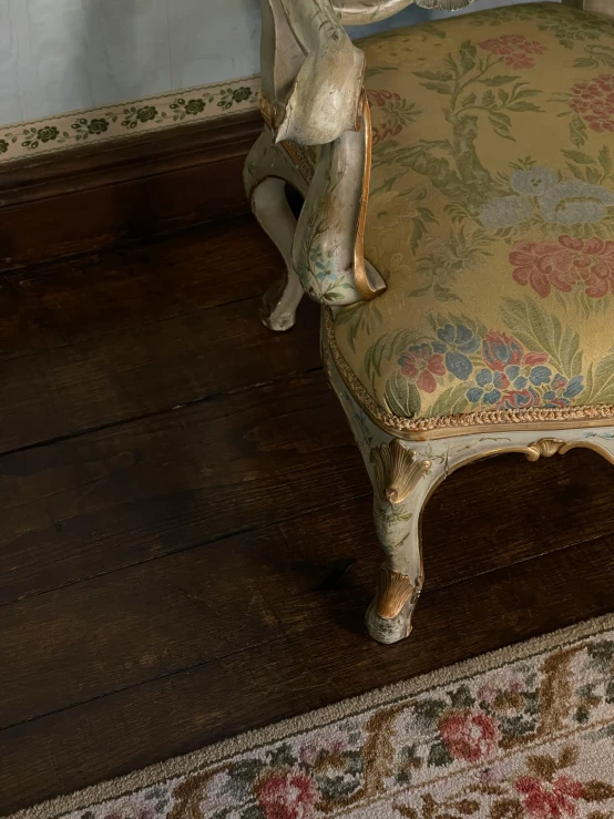 a chair that is on a hard wood floor