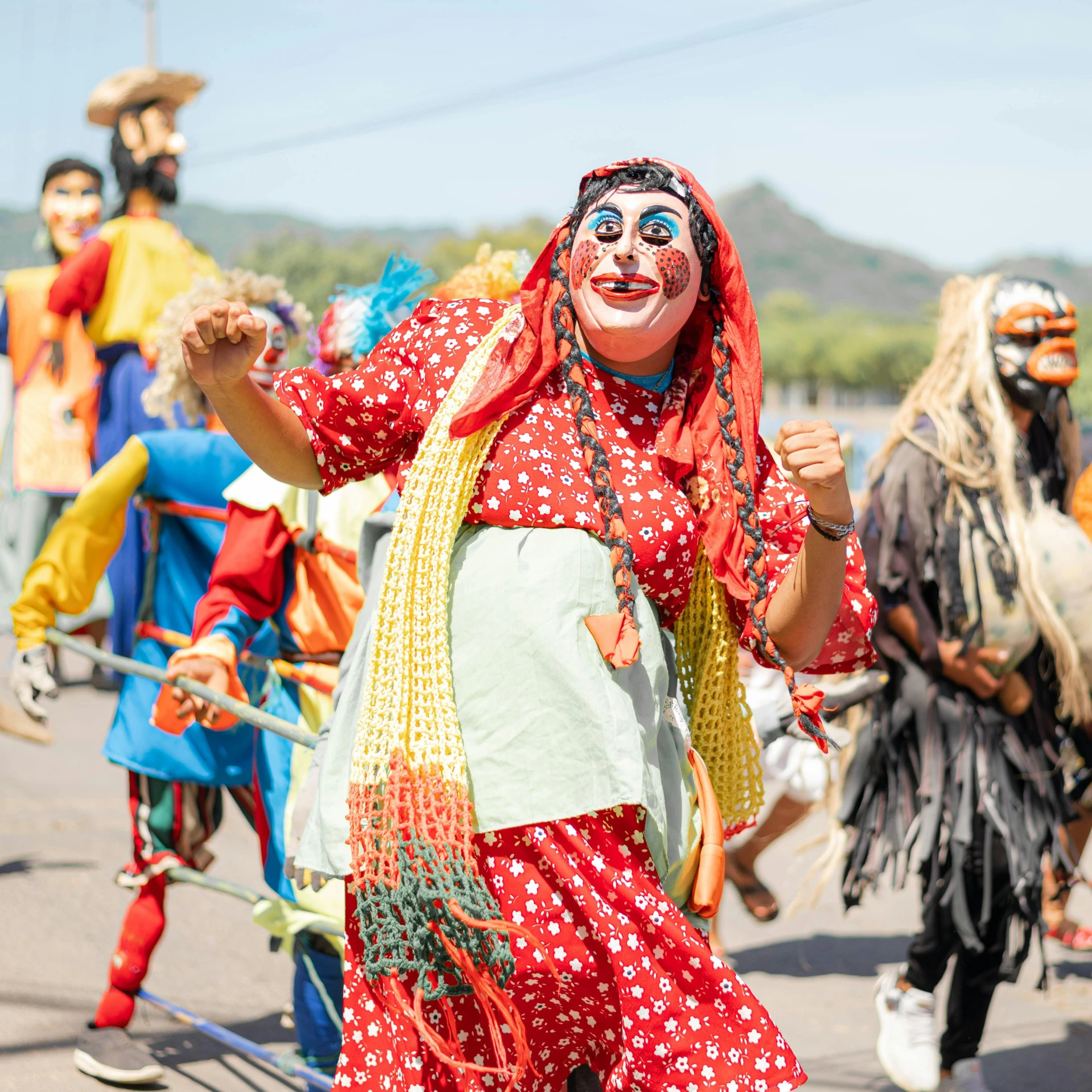 a group of clowns at an outdoor event