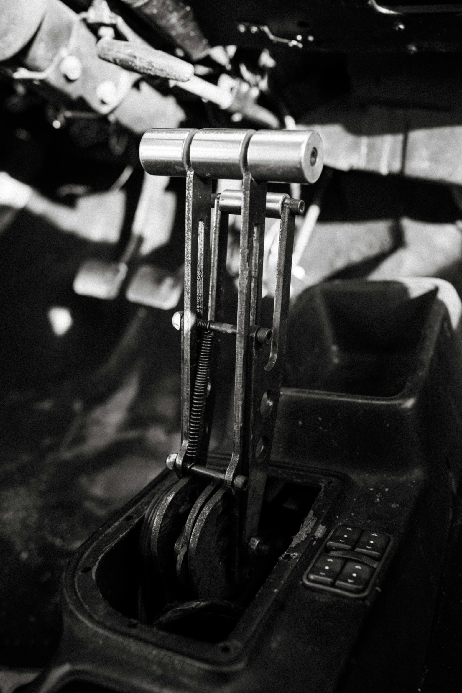 a black and white picture of some straps in a storage container