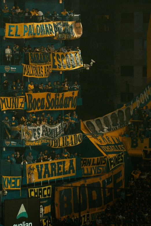 a number of yellow and black letters on a banner