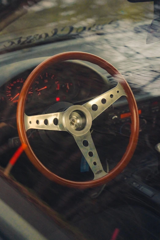 an old fashioned steering wheel in a car