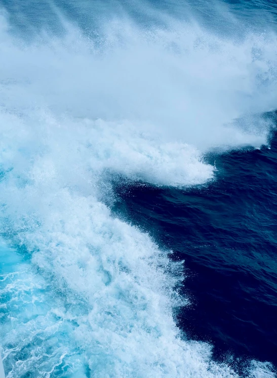 water splashing down the side of a boat