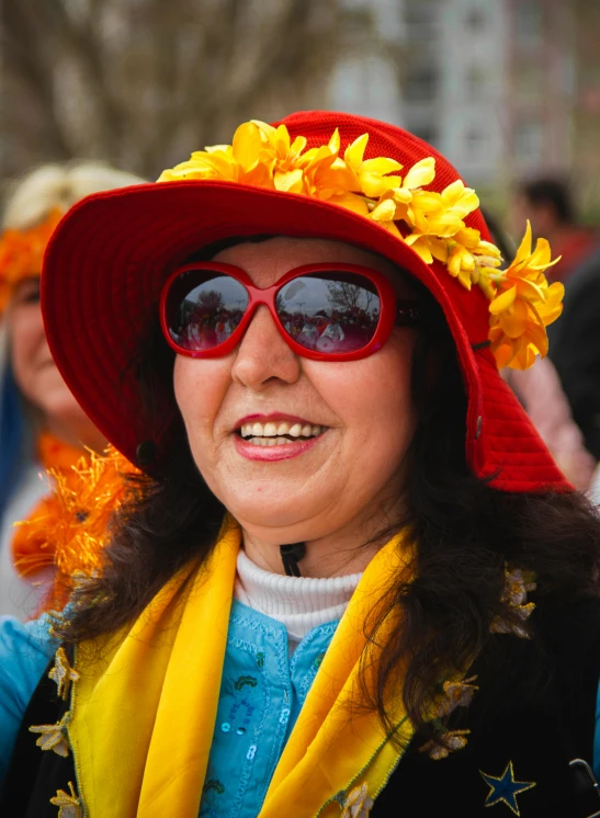 woman with sun flower wreath and red sunglasses