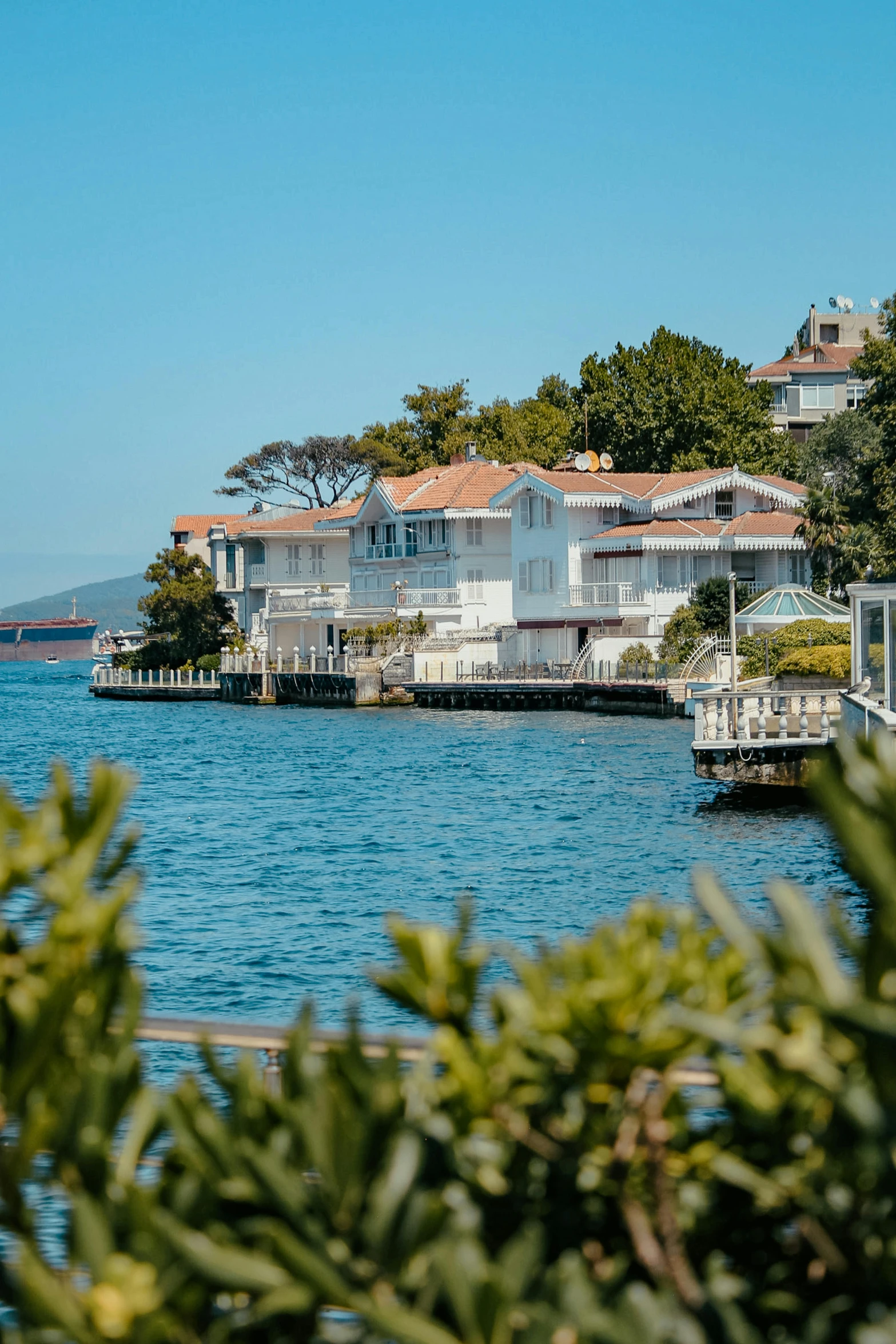 a bunch of houses sit on the water