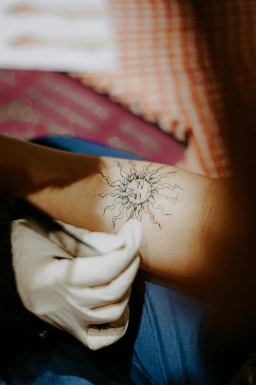 a close up of the tattoo on the back of a woman