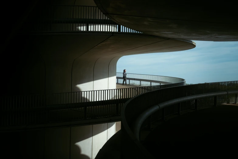 a man on a skateboard riding down a ramp