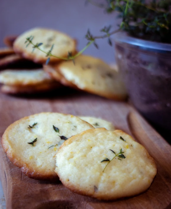 homemade cookies are scattered on a  board