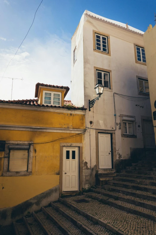 some stairs in front of an old house