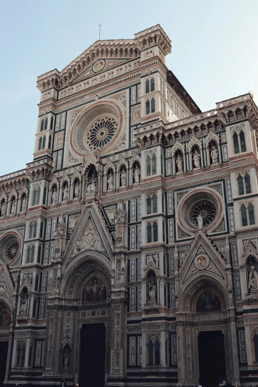 a clock is visible on the cathedral building