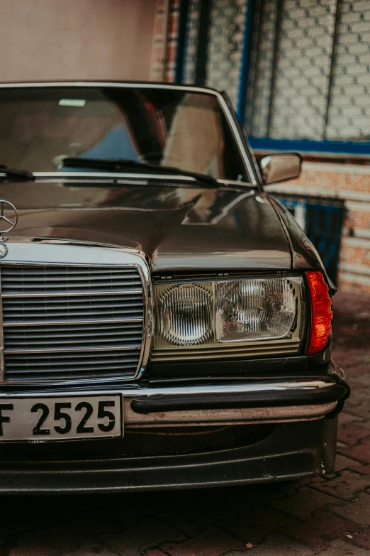 a car parked in front of an apartment