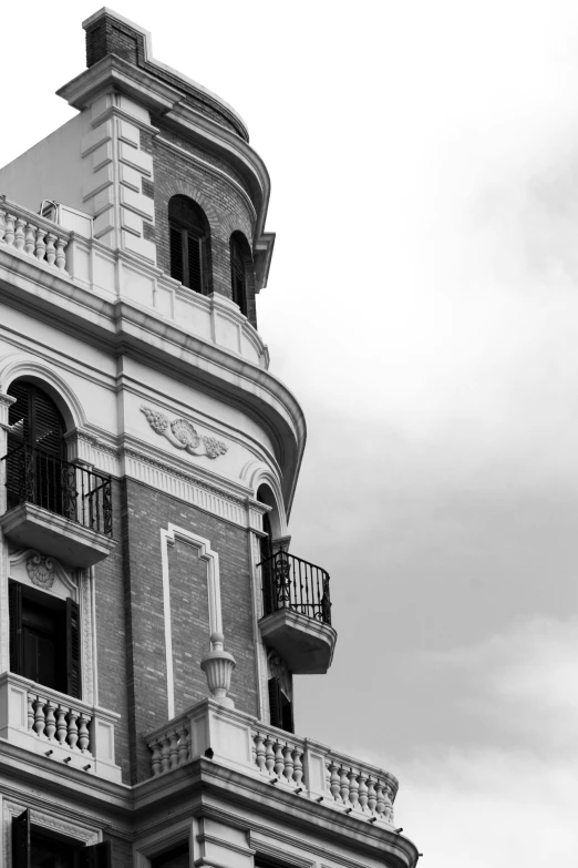 an unusual building has balconies and balcony