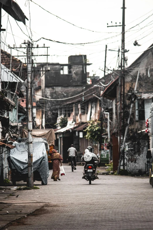 street scene with people walking on the side walk