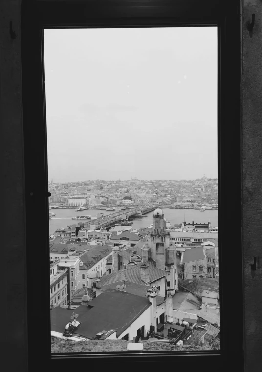 a view out of an window of a city