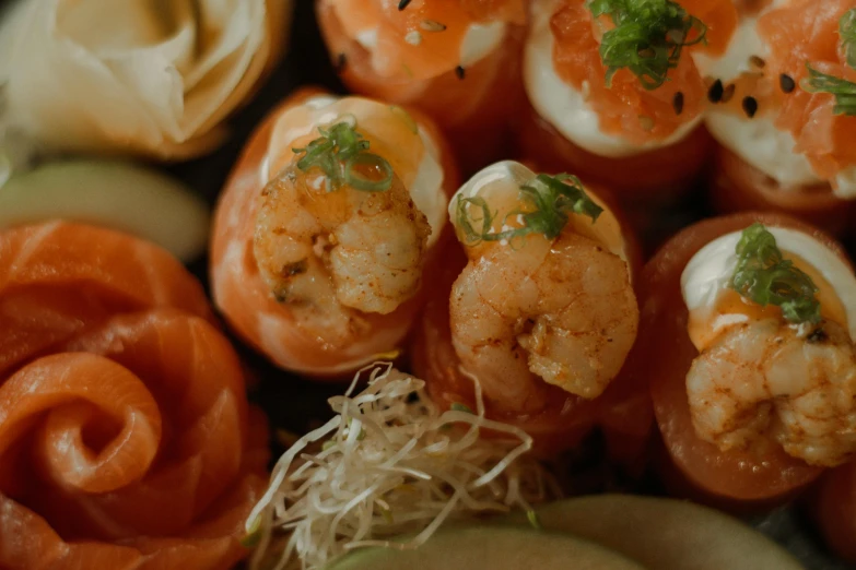 several appetizers sit together on top of some other food