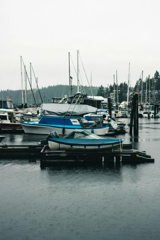 boats sit in a lake on the water