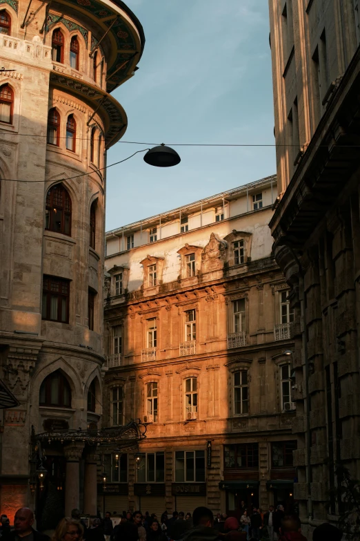 an overhead view of old buildings with people walking by