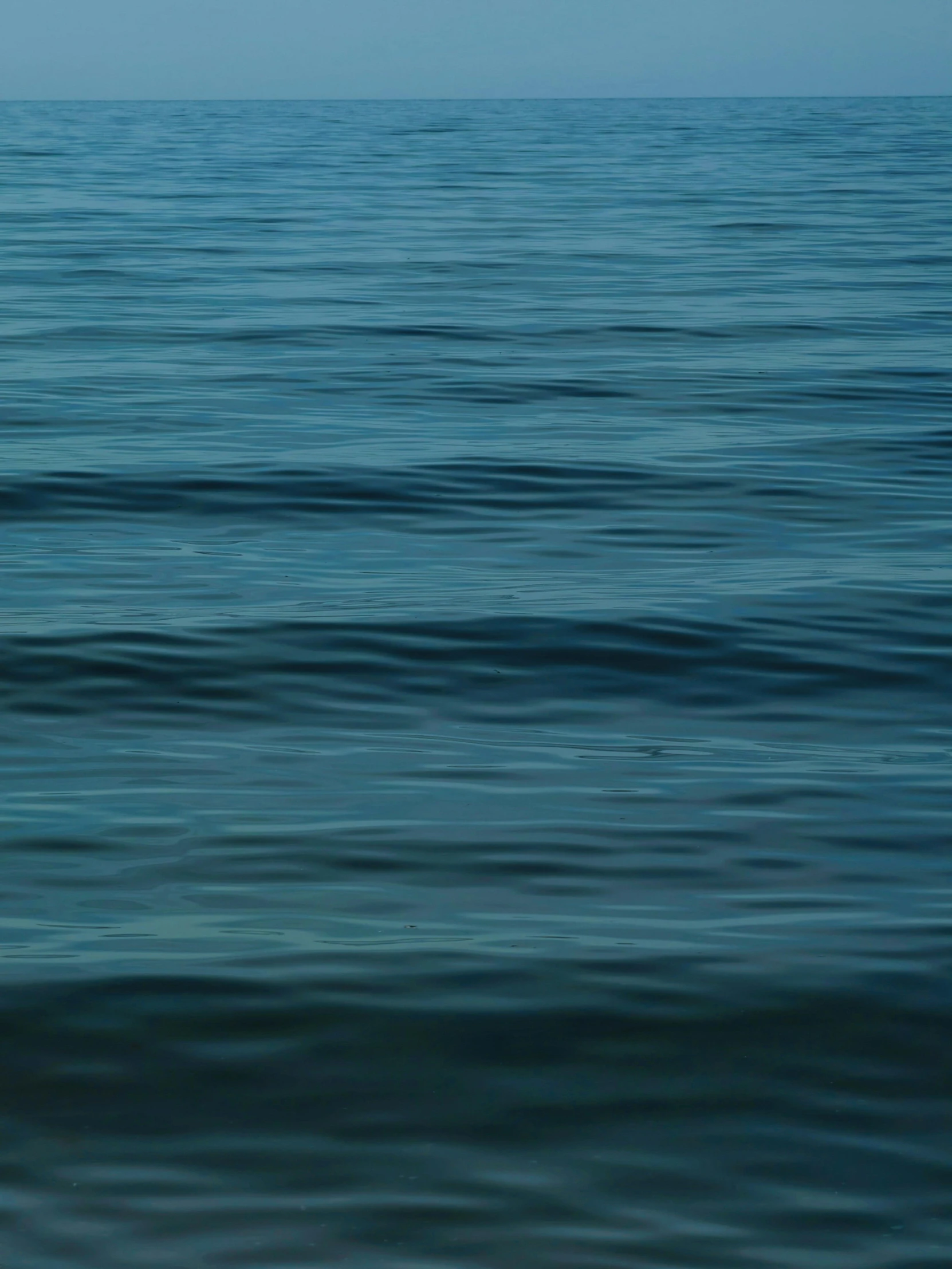 the sea is almost completely covered in clear blue water