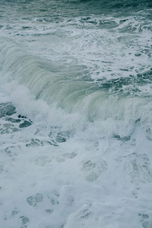 some very large waves crashing to shore