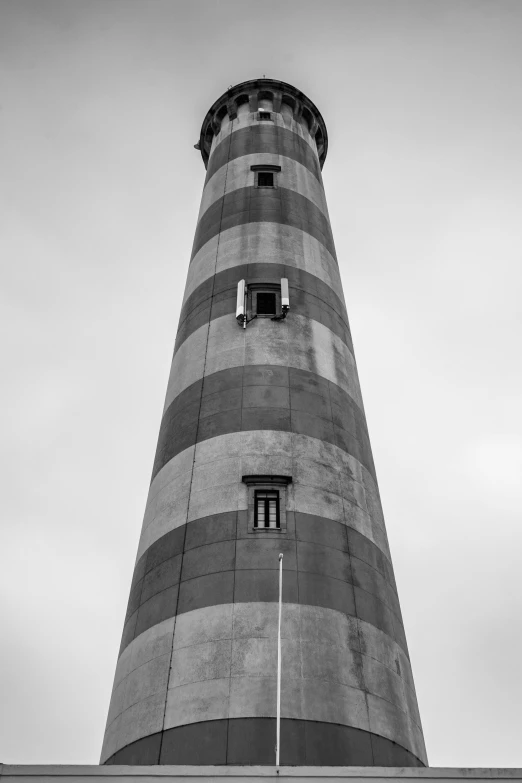 a black and white picture of a lighthouse