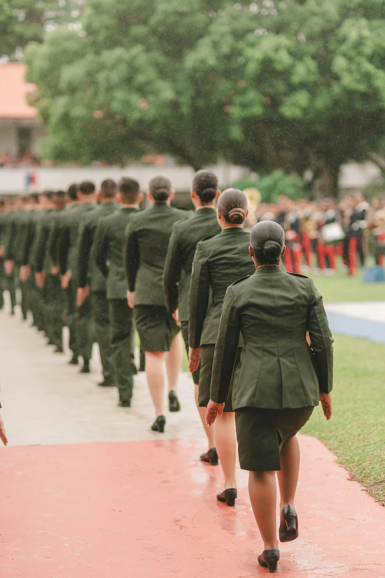 military men walking together in formation during a parade