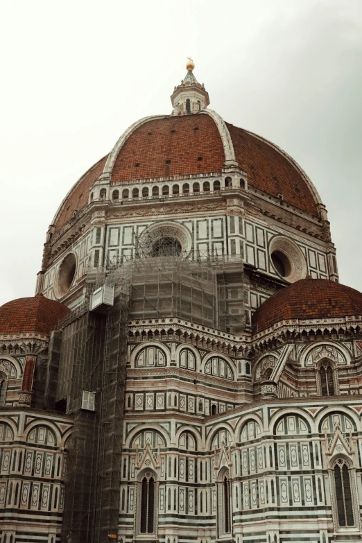 a large building with a roof that is very tall