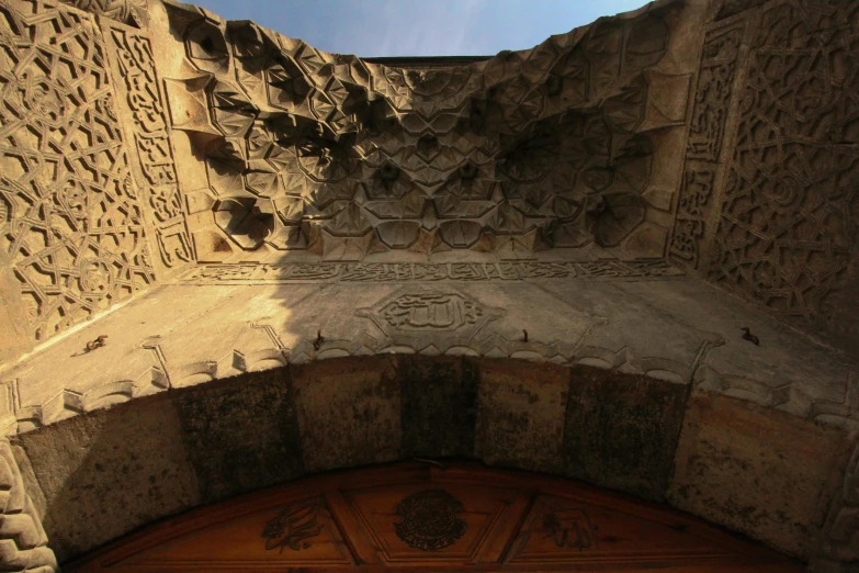 closeup of decorative door with carved stone