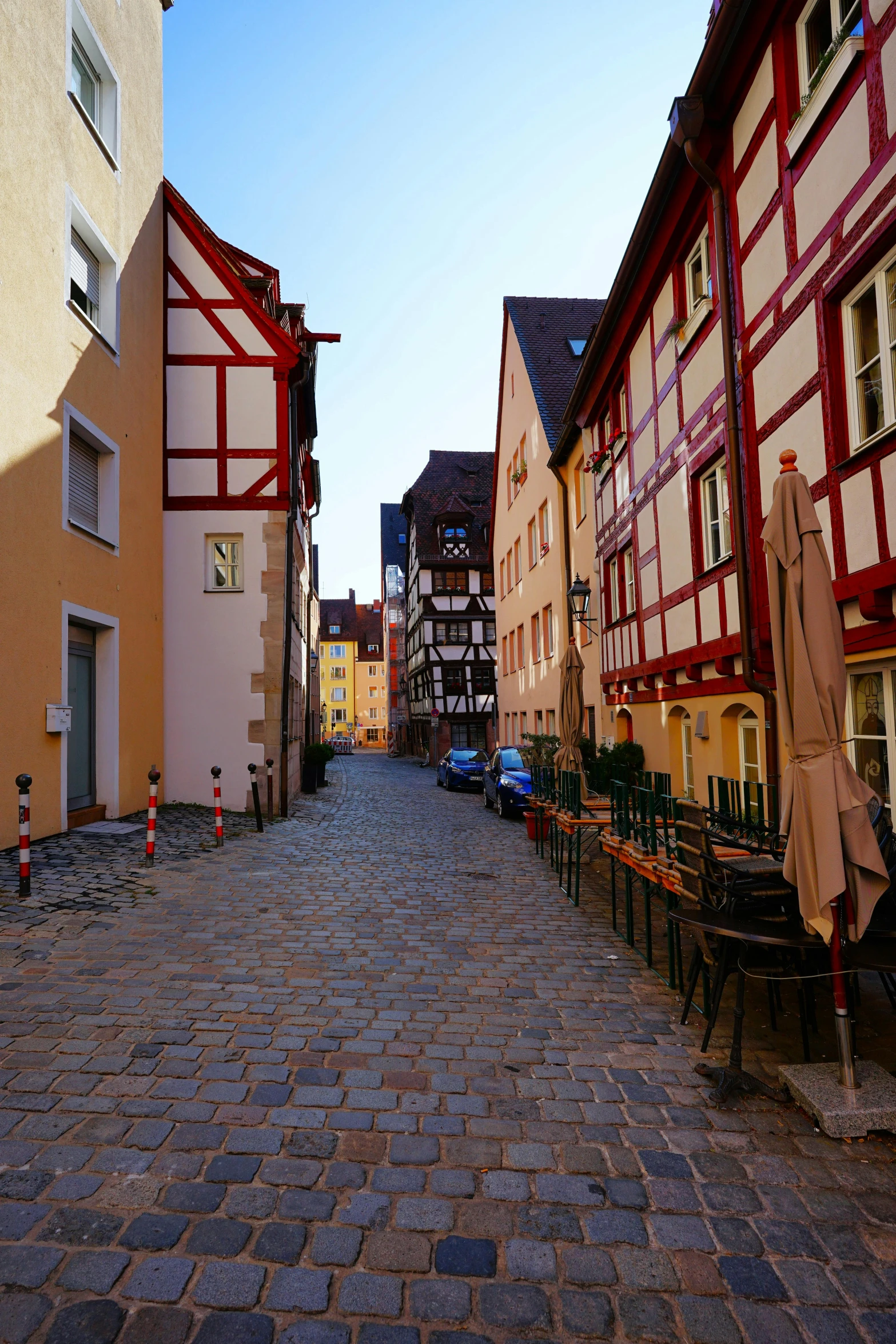 a paved road in the middle of some buildings