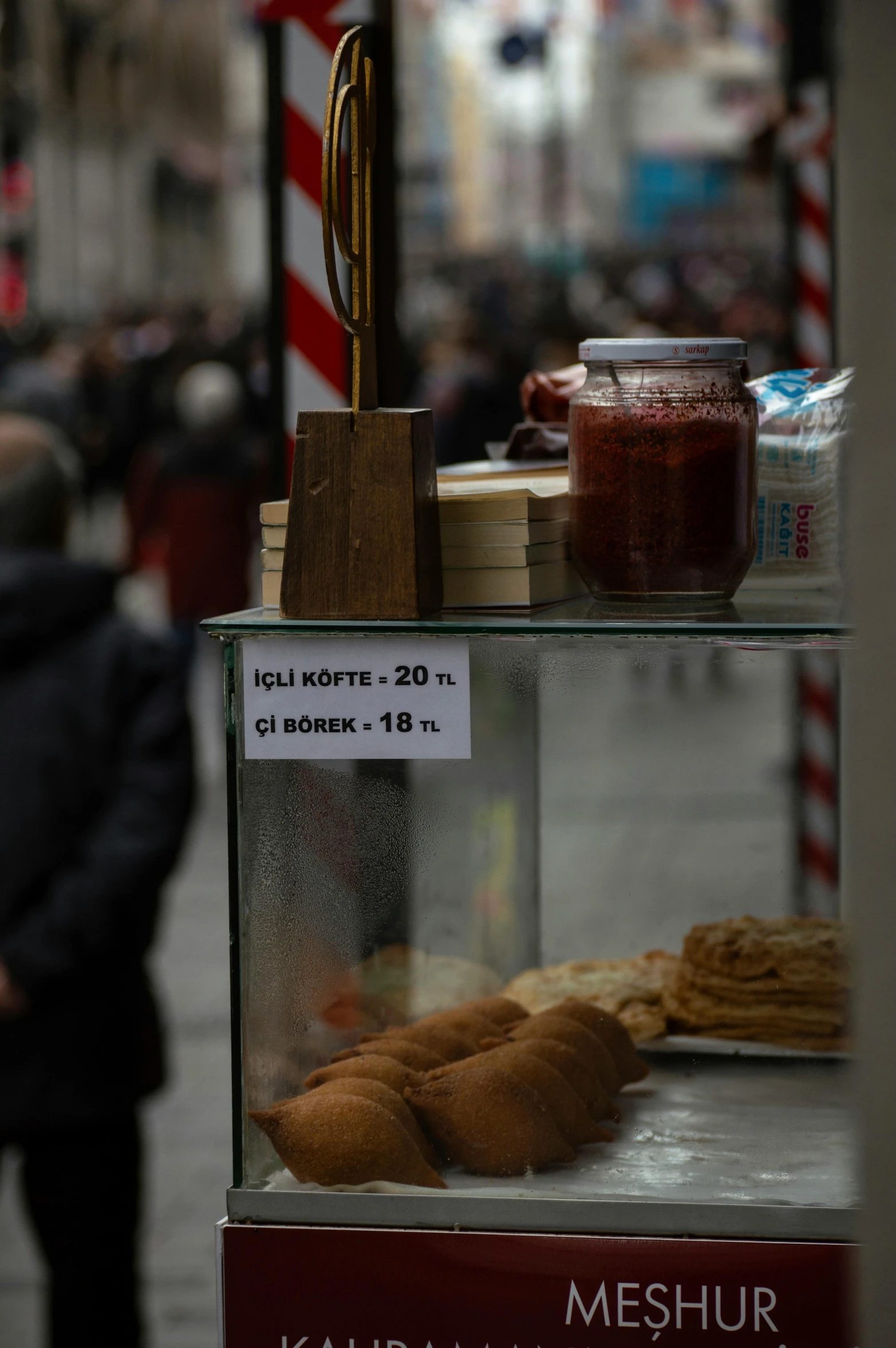 a glass case with some food in it