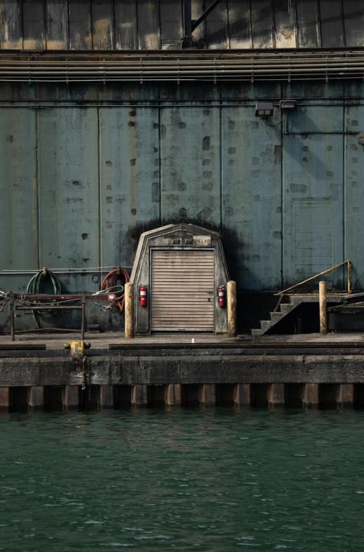 a truck parked near the water and some power lines