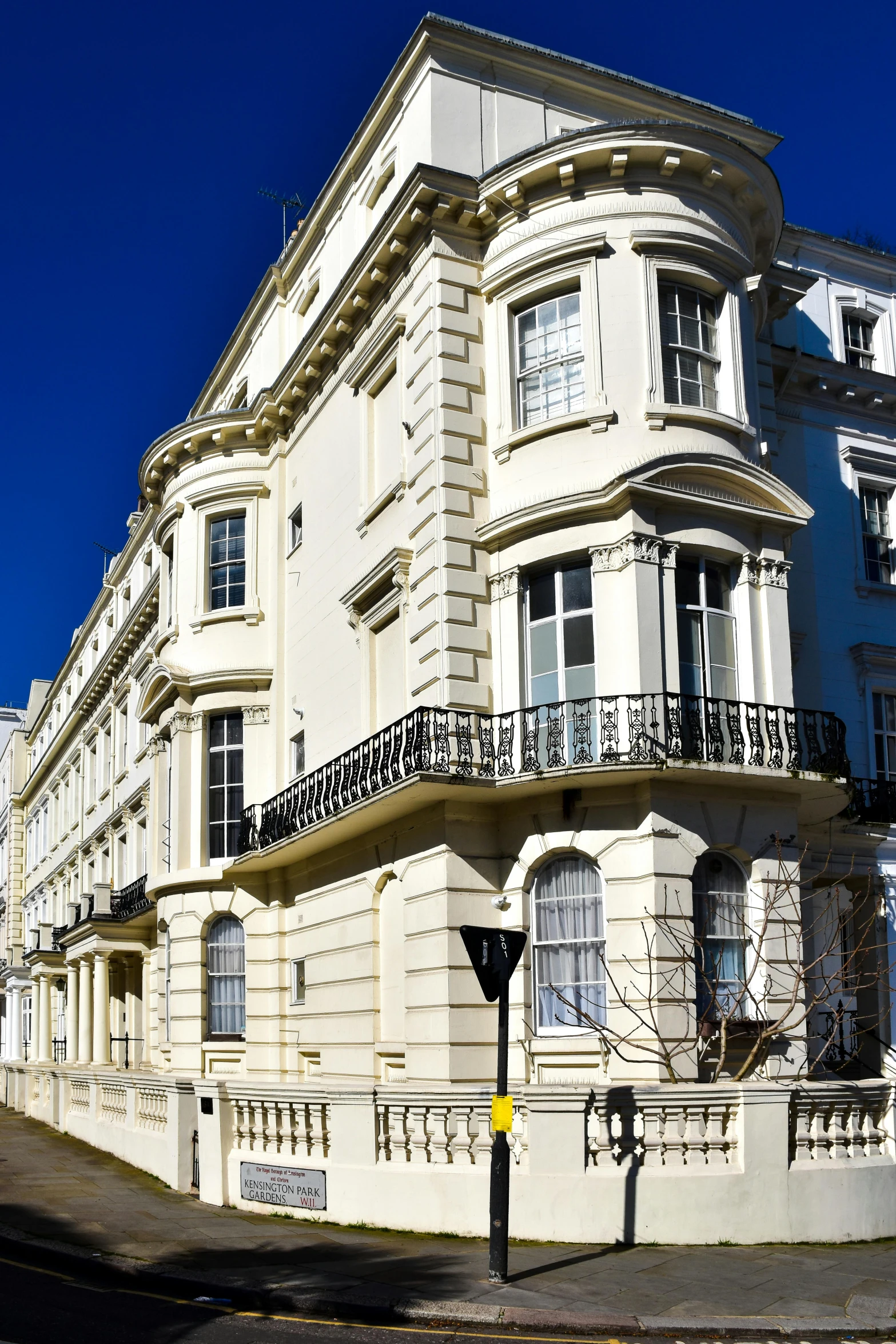 a white house with many balconies and windows