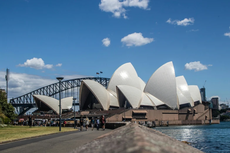 a very pretty large big pretty building by the water