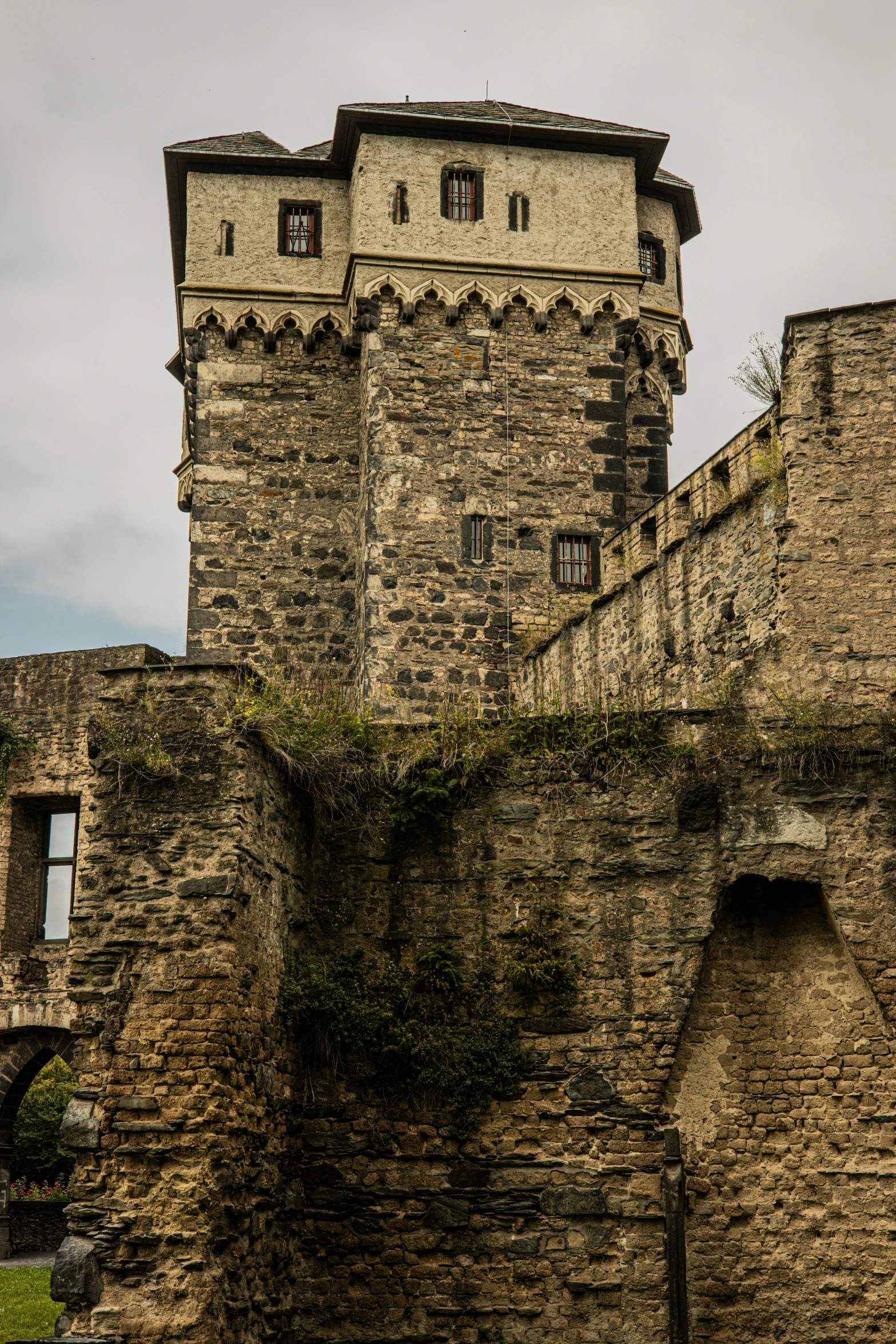 a castle has several stairs leading up and down it