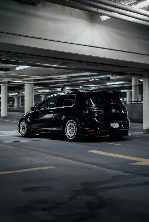 a van parked in an empty parking garage