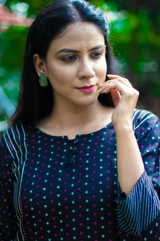 a woman is talking on her cell phone