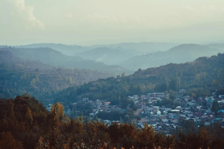 there is a village in the mountains and it looks like you're out on a game