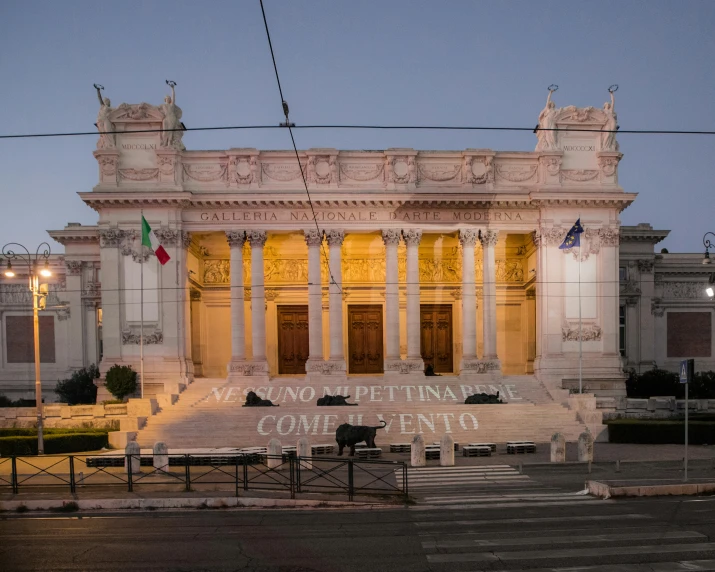 a very large building with a building on it's side