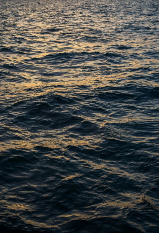 an image of water with waves coming in to shore